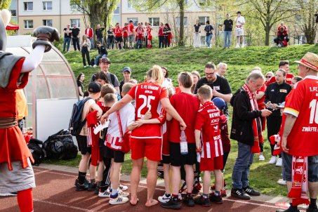 A shoeless Dina Orschmann meets the fans following her two astonishing comeback goals