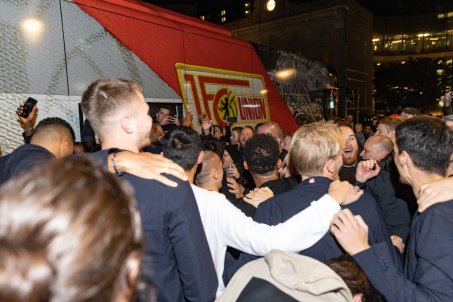 And then, as the players roll out, one by one by one, the square erupts