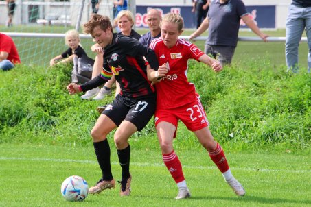 Pia Metzker tussles for the ball away in Leipzig. She would be well missed for much of the season through injury, but returned in time for the play-offs